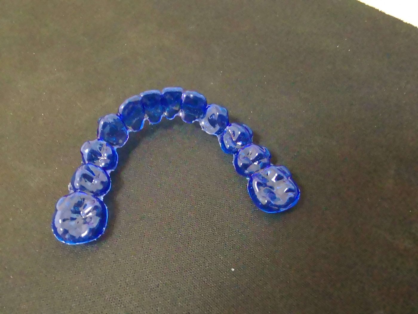 Upper aligner cut from blue sheet